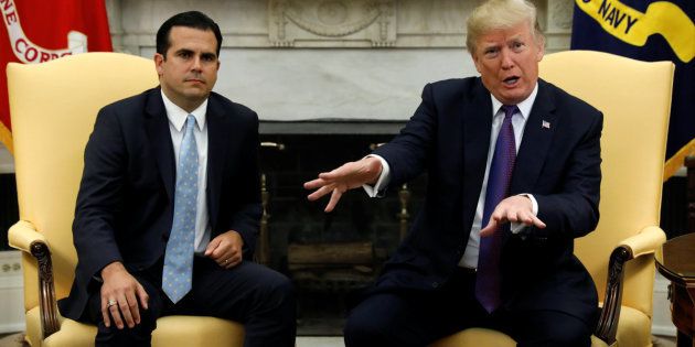 U.S. President Donald Trump meets with Puerto Rico Governor Ricardo Rossello in the Oval Office of the White House in Washington, U.S., October 19, 2017. REUTERS/Kevin Lamarque