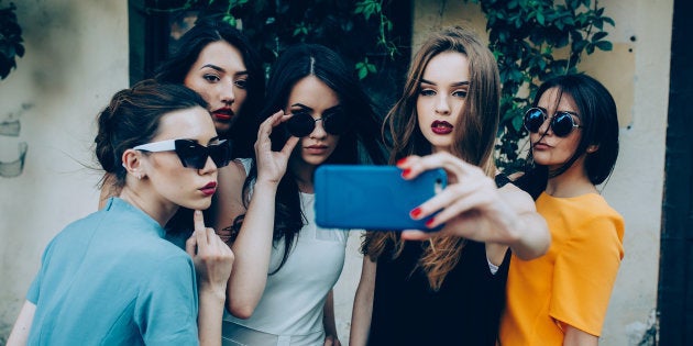 Girls taking a selfie.