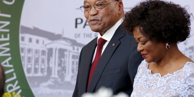 President Jacob Zuma arrives with Speaker of Parliament Baleka Mbete to give his State of the Nation address at the opening session of Parliament in Cape Town, February 11, 2016.