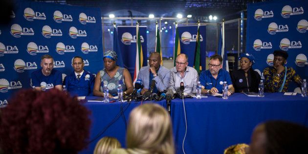 DA leadership – (L-R) deputy federal chairperson Mike Waters, deputy chairperson Refiloe Nt'sekhe, president Mmusi Maimane, federal chairperson Atholl Trollip, chairperson of the federal council James Selfe, women's network leader Nomafrench Mbombo and youth leader Luyolo Mphithi – speak at a press conference at the party's federal congress in Pretoria on April 8 2018.