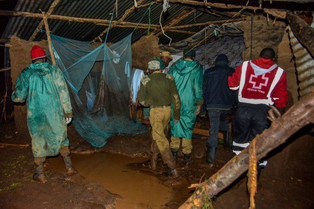 Volunteers search for survivers in a residential area after Patel dam burst its bank at Solai, about 40 kilometres north of Nakuru, Kenya, on May 10, 2018. (Photo by AFP) (Photo credit should read /AFP/Getty Images)