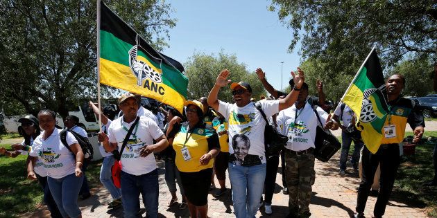 Delegates chant slogans as they arrive for the 54th National Conference of the ruling African National Congress (ANC) at the Nasrec Expo Centre in Johannesburg, South Africa December 16, 2017.