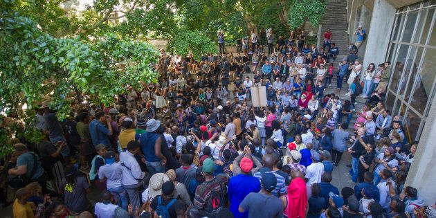 University of Cape Town students gather during the #FeesMustFall protest on October 03, 2016 in Cape Town.