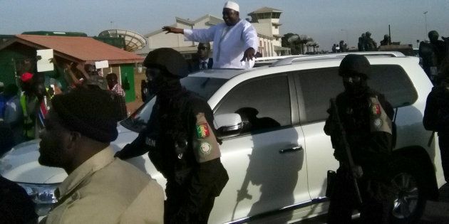 Gambia's President Adama Barrow is driven in a motorcade after arriving in Banjul, Gambia January 26, 2017.