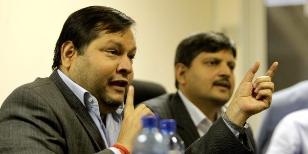 Indian businessmen Ajay and Atul Gupta speak to the City Press from the New Age Newspaper's offices in Midrand, Johannesburg, South Africa on 4 March 2011.