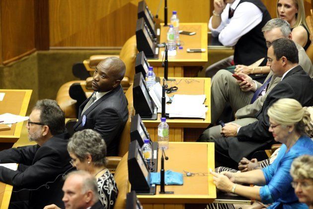 Mmusi Maimane (L) in Parliament during the state of the nation address in Cape Town. February 11 2016.