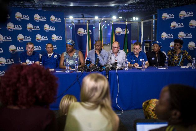 DA leadership (L-R) deputy federal chairperson Mike Waters, deputy chairperson Refiloe Nt'sekhe, president Mmusi Maimane, federal chairperson Atholl Trollip, chairperson of federal council James Selfe, women's network leader Nomafrench Mbombo and youth leader Luyolo Mphithi, speak at a press conference at the party's federal congress in Pretoria on April 8 2018.