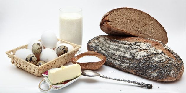 compisition of diary products - bread, milk, yogurt, eggs butter oil