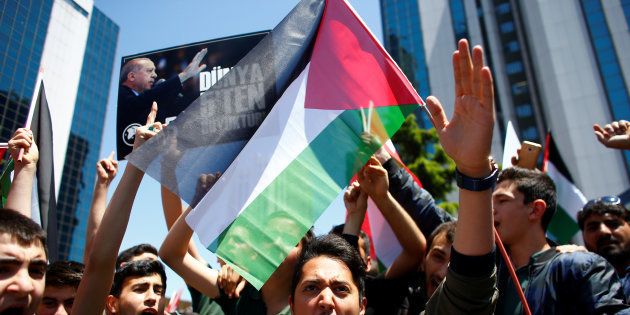 A pro-Palestinian demonstrator shouts during a protest against the U.S. embassy move to Jerusalem, near the Israeli consulate in Istanbul, Turkey May 15, 2018.