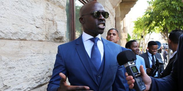 Finance Minister Malusi Gigaba speaks to members of the media after delivering his medium-term budget speech in Parliament, in Cape Town, South Africa, October 25 2017. REUTERS/Sumaya Hisham