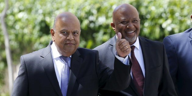 South Africa's Deputy Finance Minister Mcebisi Jonas (R) arrives with Finance Minister Pravin Gordhan for Gordhan's 2016 Budget address in Cape Town in this February 24, 2016 file photo.