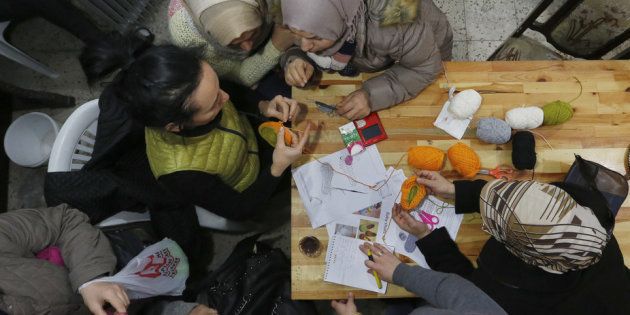 Syrian refugees attend a knitting lesson in Istanbul.