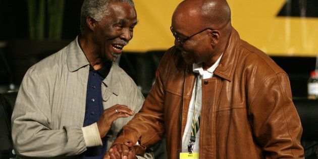 Former ANC president Thabo Mbeki (L) congratulates newly elected ANC president Jacob Zuma during a leadership conference in Polokwane December 18,2007.