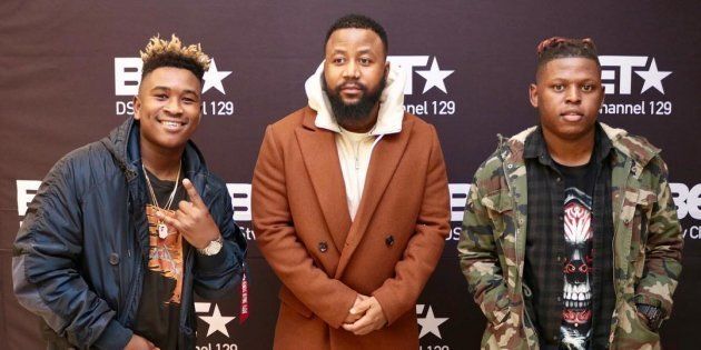 Cassper Nyovest flanked by Distruction Boyz.