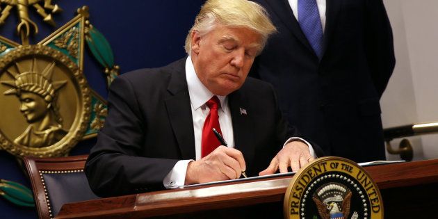 The executive order signed by Trump imposes a travel ban on refugees entering the U.S. and a hold on travelers from Syria, Iran and five other Muslim-majority countries.
