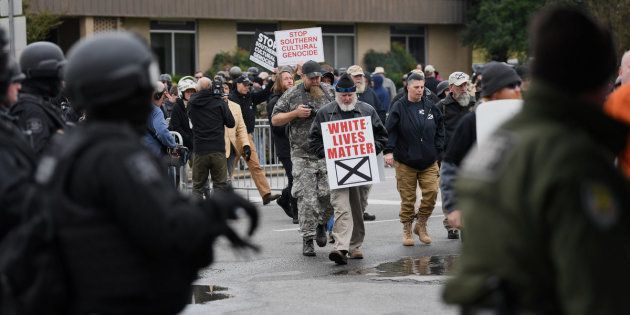 Protesters arrive at a