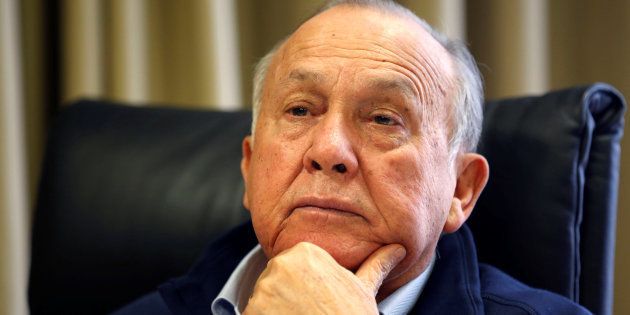 South African magnate Christo Wiese, whose companies include Steinhoff and investment heavyweight Brait, listens during an interview in Cape Town, South Africa, September 27, 2016.