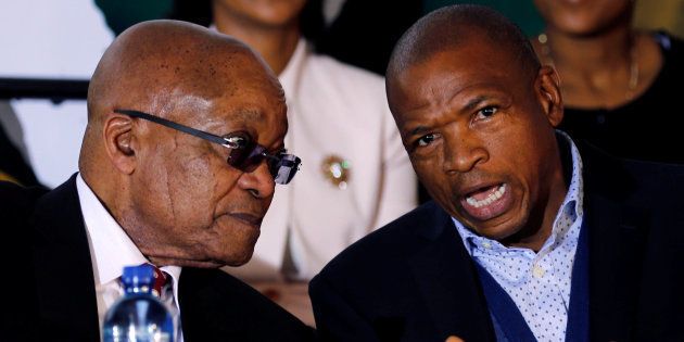 Jacob Zuma chats with Supra Mahumapelo before addressing the National Youth Day commemoration in Ventersdorp. June 16, 2017.
