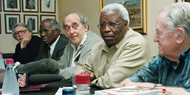 This file picture from December 16, 2001, shows a Rivonia Treason trialists reunion. From left are: advocate Arthur Chaskalson, from the legal team who defended the Rivonia trialists, and former Chief Justice; trialist Andrew Mlangeni; trialist Denis Goldberg; trialist and former Eastern Cape Premier Raymond Mhlaba; and trialist Rusty Bernstein.