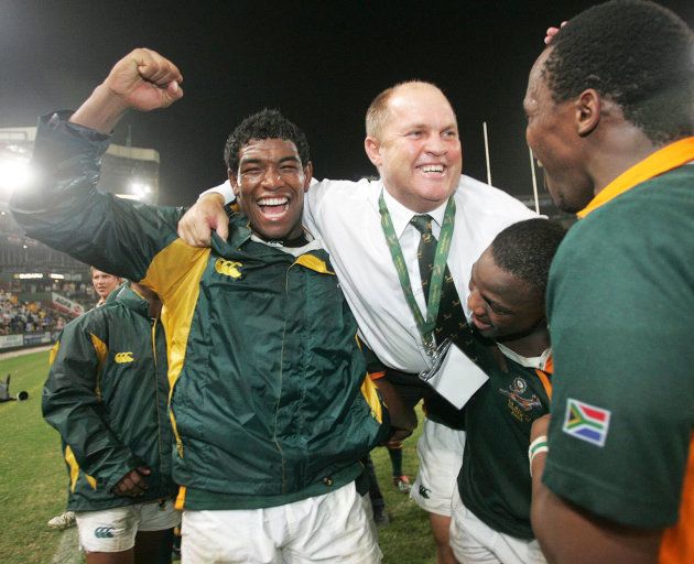 Coach Eugene 'Loffie' Eloff celebrates with the SA U19 side, after defeating New Zealand in the IRB U19 World Championship at Absa Stadium; April 17 2005 in Durban.