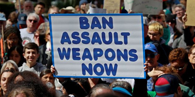 A protester holds a sign during a