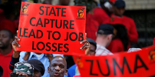 Protesters attend a demonstration organised by Cosatu in Johannesburg, South Africa, September 27, 2017.