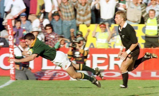 PRETORIA, SOUTH AFRICA - AUGUST 24: Joost van der Westhuizen dives over to score a try during the 2nd Test match between South Africa and New Zealand at Loftus Versfeld on August 24, 1996 in Pretoria, South Africa. New Zealand won the test match, also the series and their first test series in SA. (Photo by Carl Fourie/Gallo Images)
