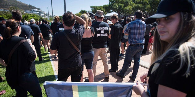 Protesters gather at a demonstration by South African farmers & farm workers at the Green Point stadium to protest against farmer murders in the country, on 30 October, 2017, in Cape Town.