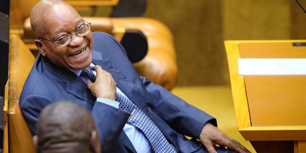 South African President Jacob Zuma laughs ahead of Finance Minister Pravin Gordhan's medium term budget speech in Cape Town, South Africa October 26, 2016.