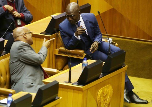 President Jacob Zuma shares a word with finance minister Malusi Gigaba during Gigabas Medium-term budget speech in Parliament on October 25, 2017 in Cape Town.