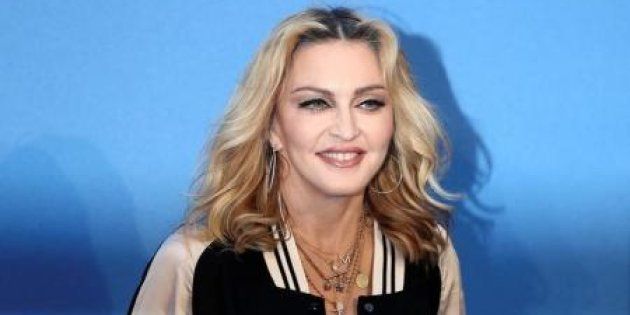 Singer Madonna has adopted two more children from Malawi: 4-year-old twin girls.