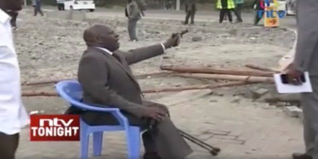 Kenyan senator Paul Njoroge waves a pistol around.