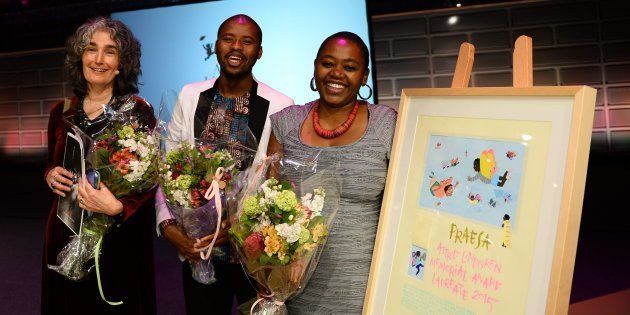 (L-R) Carole Bloch, Malusi Ntoyapi, and Ntombizanele Mahobe from the South African organization PRAESA (The Project for the Study of Alternative Education in South Africa) pose with the diploma after receiving the Astrid Lindgren Memorial Award (ALMA) during an award cermony at the Stockholm Concert Hall on June 1, 2015.