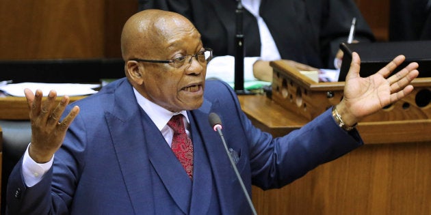 President Jacob Zuma gestures as he addresses Parliament on Thursday.REUTERS/Sumaya Hisham