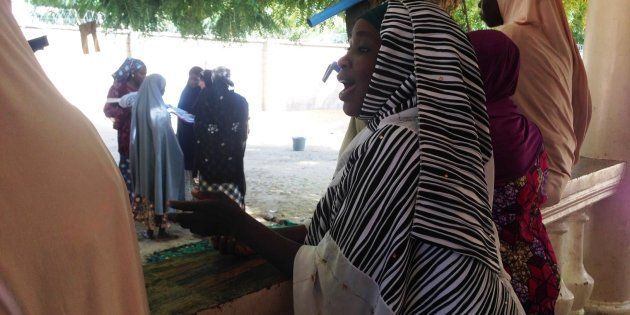 Aisha, the former wife of a Boko Haram commander, talks to another woman at a deradicalisation programme in Maiduguri, Nigeria, Jan 25, 2017.