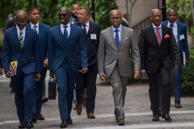 Finance Minister Malusi Gigaba is flanked on his right by treasury director-general Dondo Mogajane and on his left by his deputy Sfiso Buthelezi and SARS commissioner Tom Moyane during Gigaba's Medium-term budget speech in Parliament.