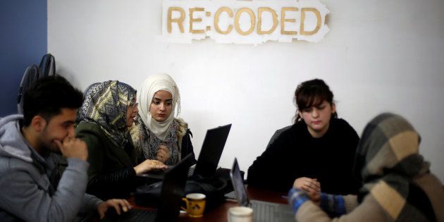 Syrian refugees and displaced Iraqis attend their class to learn basic and advanced coding skills at the Re:Coded boot camp, in Erbil, Iraq on February 1, 2017.