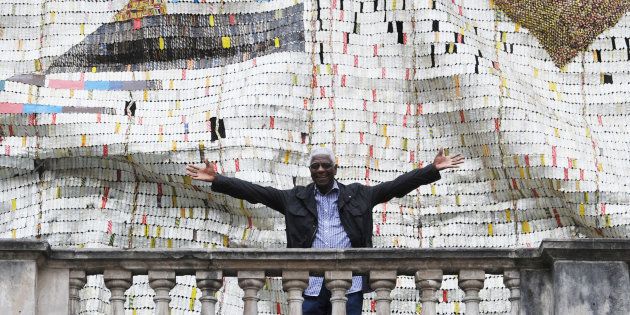El Anatsui with his work entitled TSIATSIA – Searching for Connection. A solo exhibition of the artist will be on at the Goodman Gallery in Johannesburg from late November.