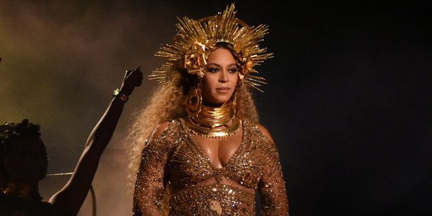 Beyonce performs as she is pregnant with twins during the 59th Annual Grammy music Awards on February 12, 2017, in Los Angeles, California.