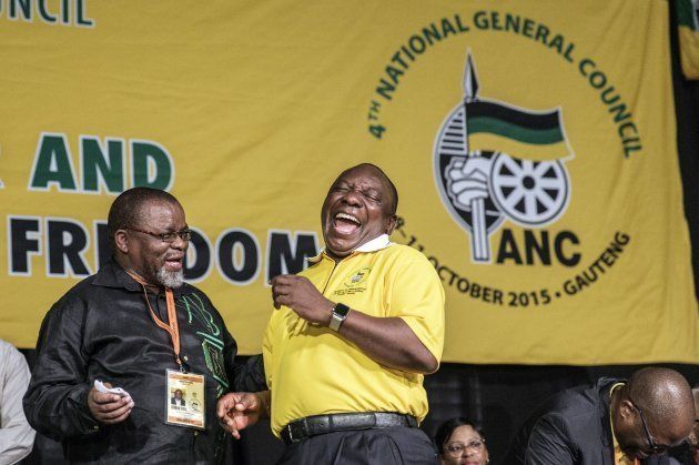 Deputy President of South Africa and ruling party ANC (African National Congress) Cyril Ramaphosa (R), laughs with Secretary-General Gwede Mantashe (L).