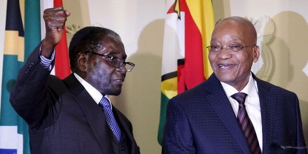 Zimbabwe's President Robert Mugabe (L) and South Africa's President Jacob Zuma (R).