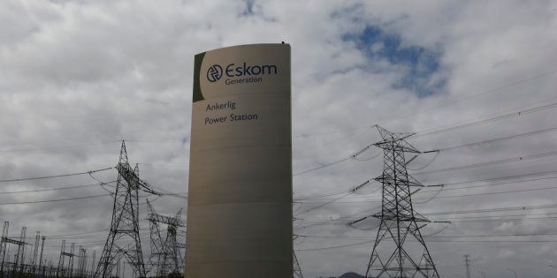 Pylons carry electricity from a sub-station of state power utility Eskom outside Cape Town in this picture taken 20 March 2016. REUTERS/Mike Hutchings