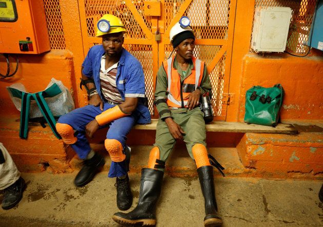 Miners take a break in a waiting area deep underground at Sibanye Gold's Masimthembe shaft in Westonaria, South Africa, April 3, 2017.