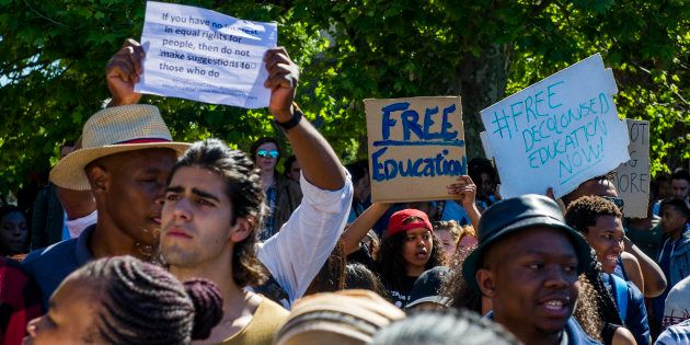University of Cape Town students march during the #FeesMustFall protest on October 03, 2016 in Cape Town, South Africa.