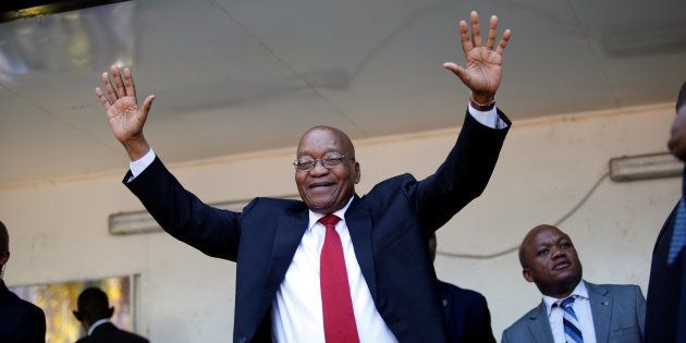 Jacob Zuma, former president of South Africa waves to his supporters on his way to the high court in Durban, South Africa, April 6, 2018.