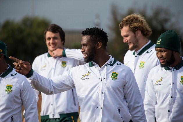 Springbok captain Siya Kolisi and team mates arrives at the Jabulani Technical High School for a rugby clinic coaching session with Aspiring rugby players from nearby high schools on 31 May 2018 in Soweto. (Photo by WIKUS DE WET / AFP) (Photo credit should read WIKUS DE WET/AFP/Getty Images)