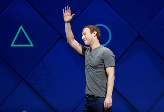 Facebook founder and CEO Mark Zuckerberg waves as he leaves the stage during the annual Facebook F8 developers conference in San Jose, Calif., April 18.