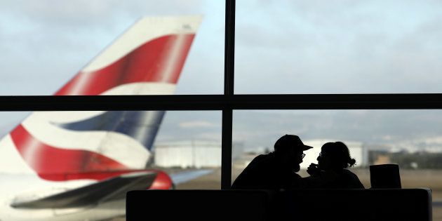 A British Airways Boeing 747 passenger aircraft prepares to take off as passengers wait to board a flight in Cape Town International airport in Cape Town, South Africa, January 12, 2018.
