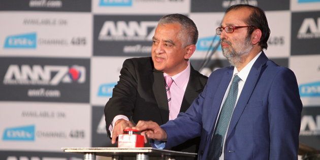 Moegsien Williams, left, the editor of the Gupta-owned The New Age newspaper, with the then Minister of Communications Yunus Carrim at the launch of ANN7 news channel in August 2013 in Johannesburg. A new study has found that The New Age gets more than its fair share of government advertising.