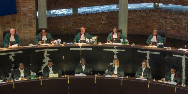 Chief Justice Mogoeng Mogoeng speaks during a hearing brought by opposition parties seeking an order for parliament to impeach South Africa's president for failing to uphold the constitution on September 5, 2017 at the Constitutional Court in Johannesburg.